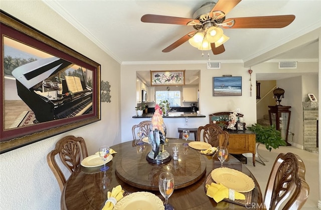 dining area featuring ornamental molding