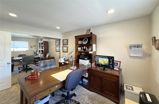 view of carpeted office space