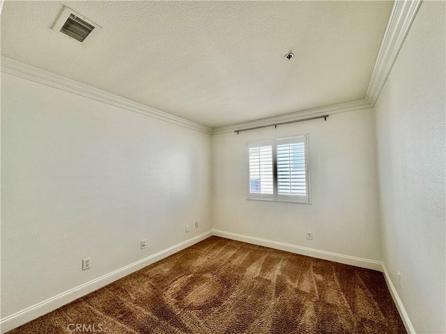 carpeted empty room featuring crown molding