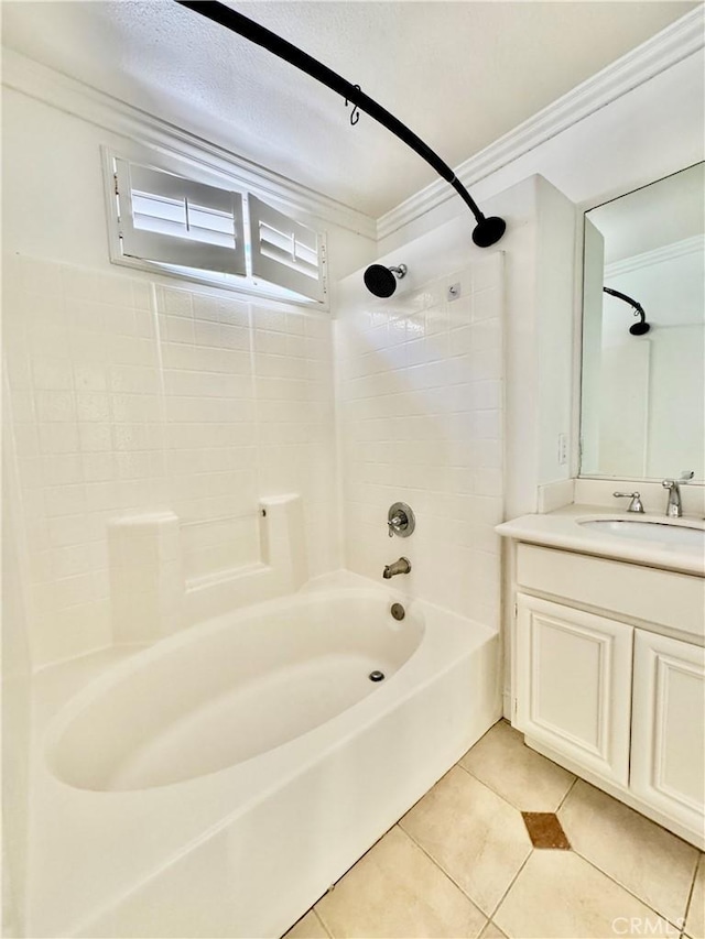 bathroom featuring ornamental molding, vanity, shower / washtub combination, and tile patterned flooring