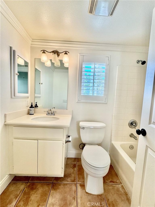 full bathroom featuring crown molding, tiled shower / bath, a textured ceiling, toilet, and vanity