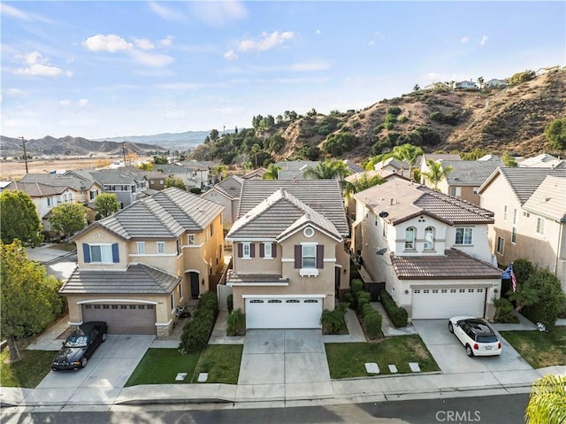 drone / aerial view featuring a mountain view