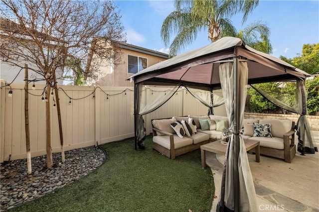 exterior space with a gazebo and an outdoor hangout area