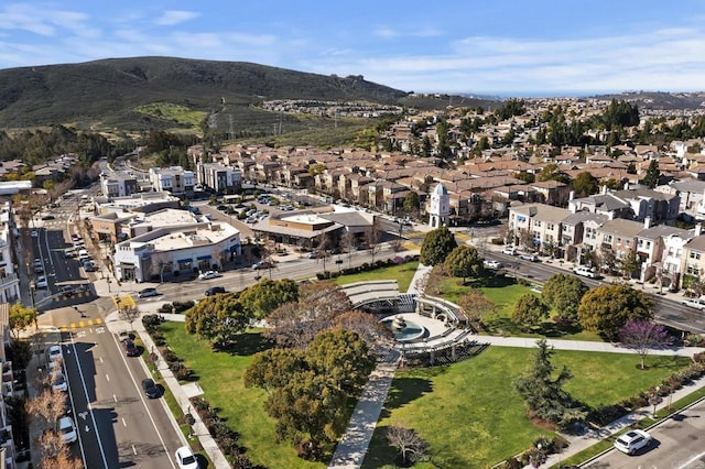 birds eye view of property featuring a mountain view