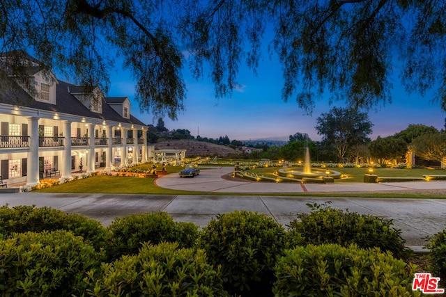 view of community featuring a lawn