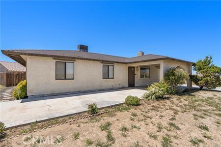 rear view of property with a patio area