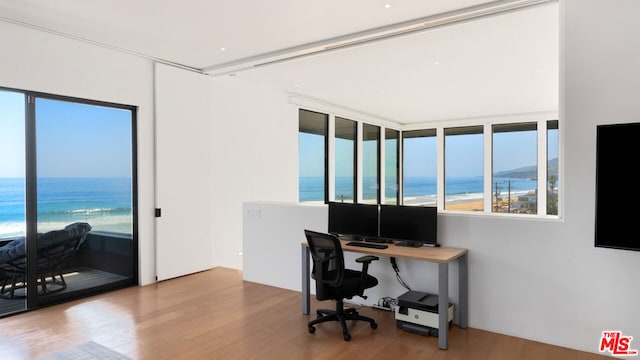 office space with light wood-type flooring