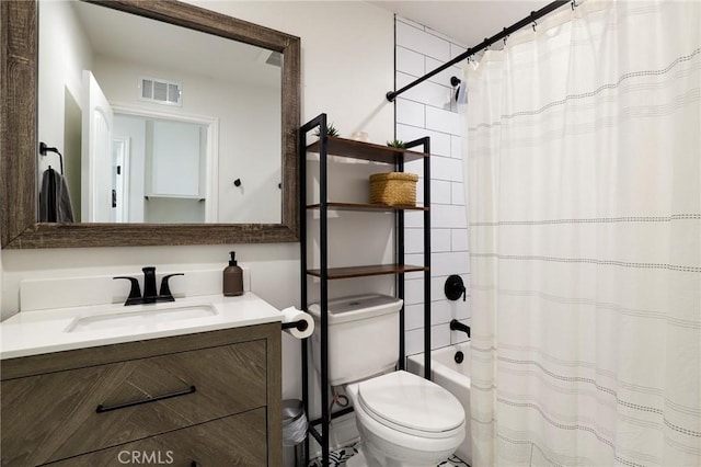 full bathroom with shower / bath combo with shower curtain, toilet, and vanity