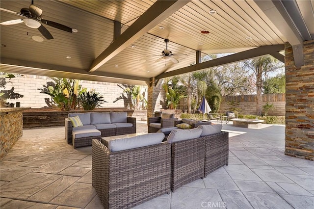 view of patio featuring an outdoor hangout area and ceiling fan