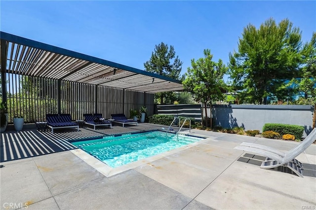 view of pool with a pergola and a patio