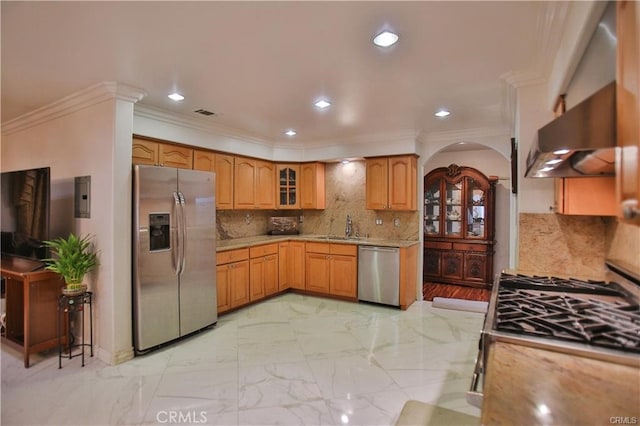 kitchen featuring sink, crown molding, stainless steel appliances, and tasteful backsplash