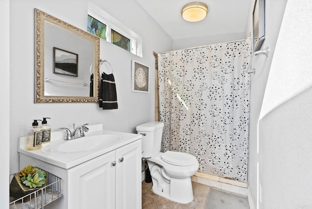 bathroom featuring toilet, tile patterned flooring, a shower with curtain, and vanity