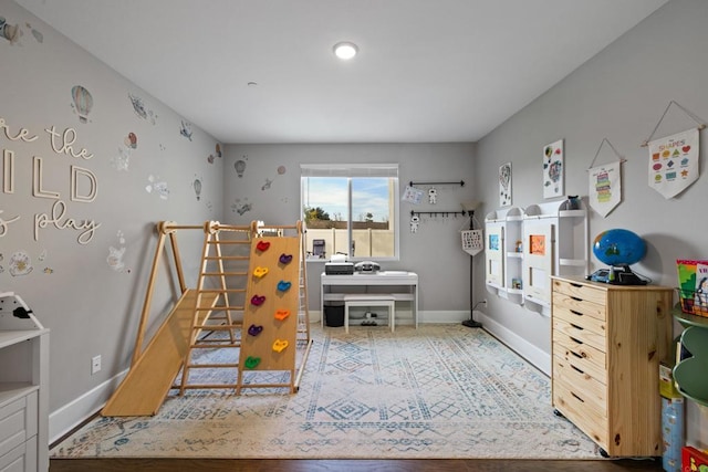 bedroom with wood-type flooring