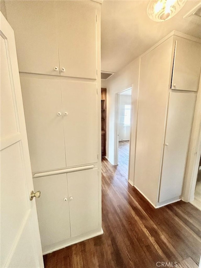 interior space with dark wood-type flooring