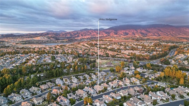 birds eye view of property featuring a residential view and a mountain view