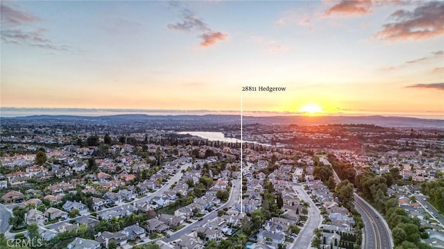 birds eye view of property with a residential view