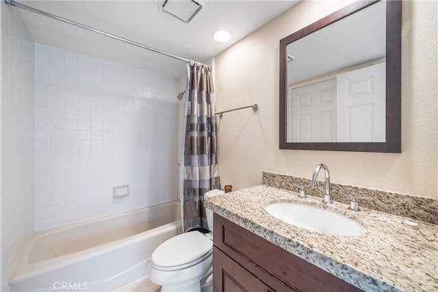 full bathroom featuring toilet, vanity, and shower / bathtub combination with curtain