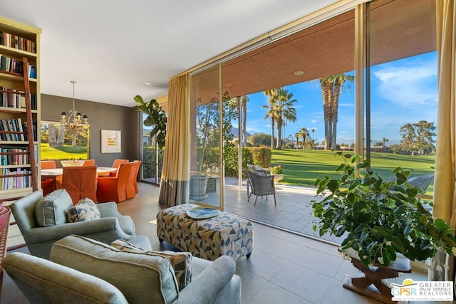 living room featuring a wealth of natural light and light tile patterned flooring