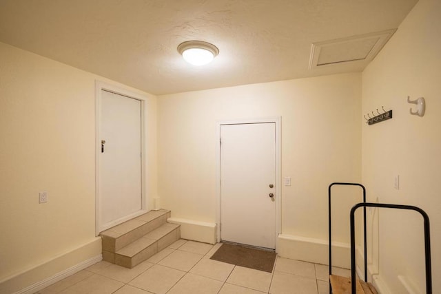 interior space featuring light tile patterned floors