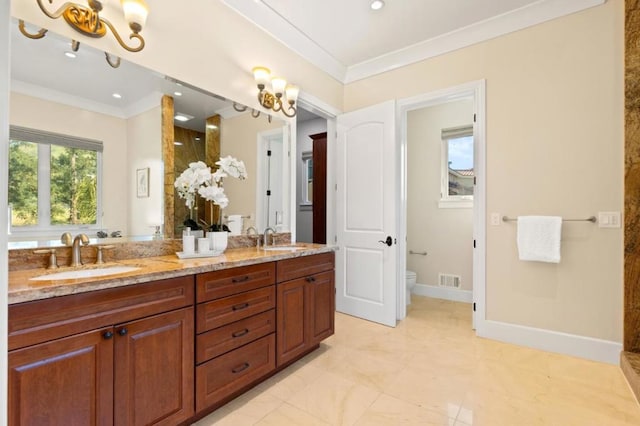 bathroom with vanity, toilet, walk in shower, and ornamental molding