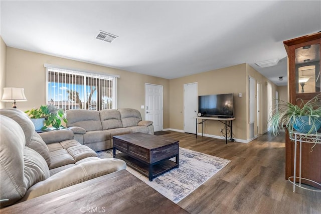 living room featuring dark wood-type flooring