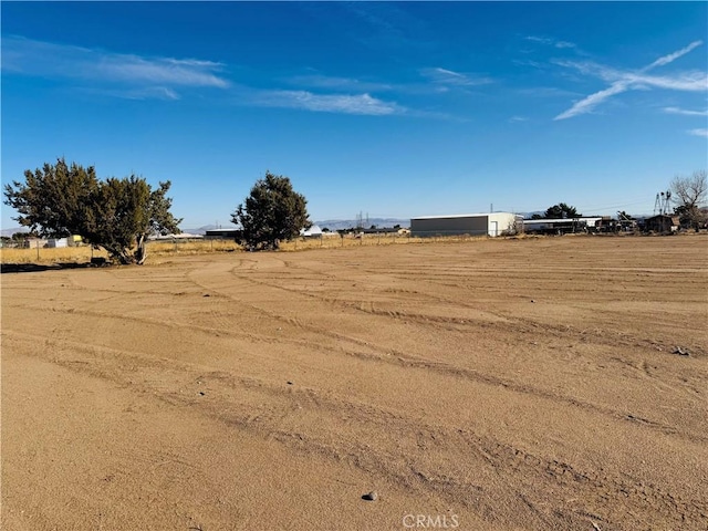 view of yard featuring a rural view