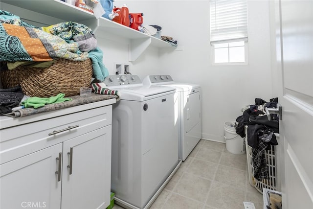 clothes washing area with washer and dryer