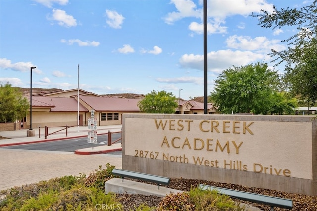 view of community sign