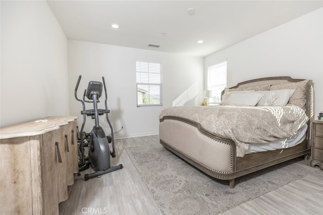 bedroom featuring light wood-type flooring