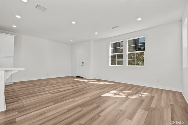 empty room with light wood-type flooring