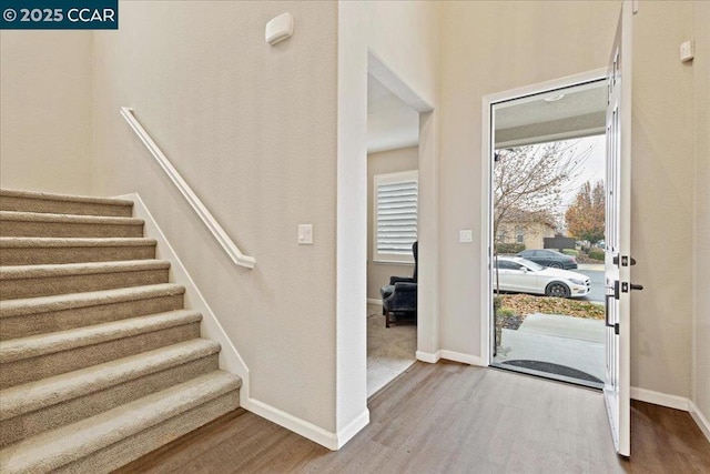 foyer with hardwood / wood-style flooring