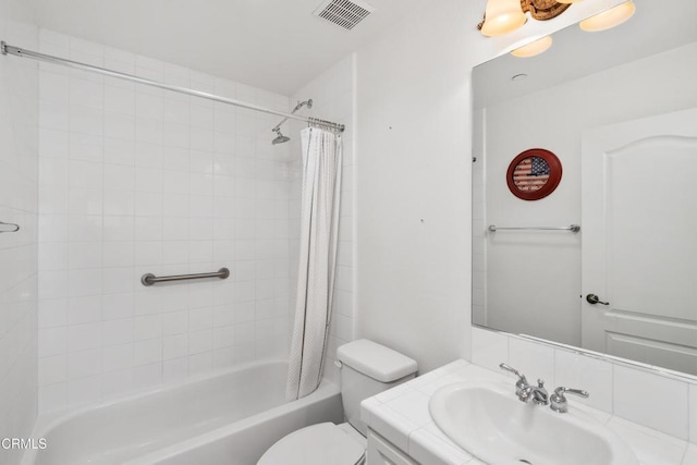 full bathroom with toilet, vanity, and shower / bath combination with curtain