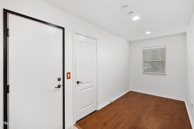 interior space with hardwood / wood-style floors