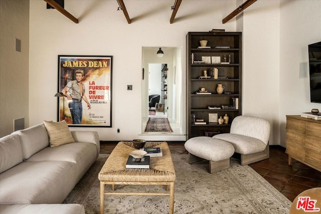 living room with beamed ceiling