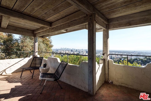 view of patio / terrace with a balcony