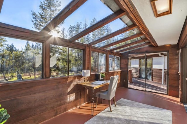 sunroom / solarium with lofted ceiling