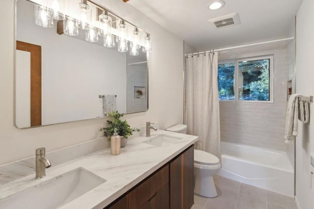 full bathroom featuring toilet, vanity, shower / tub combo, and tile patterned flooring