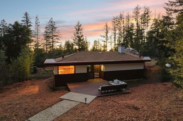 view of front of house featuring a wooden deck