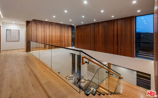 interior space featuring hardwood / wood-style floors and expansive windows