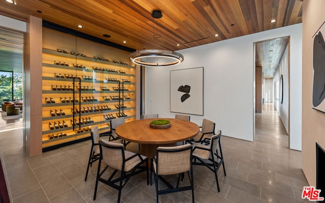 dining room featuring wooden ceiling