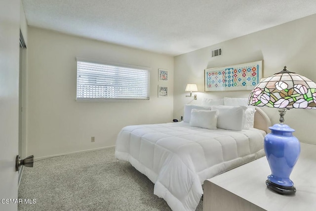 bedroom featuring light carpet and a closet