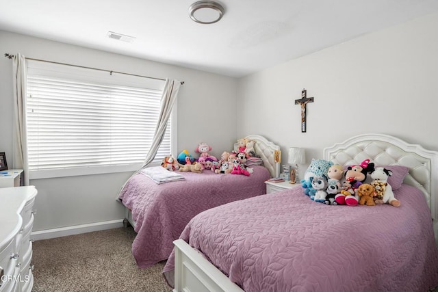 bedroom featuring light carpet