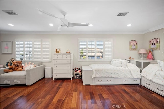 bedroom with ceiling fan, dark hardwood / wood-style flooring, and multiple windows