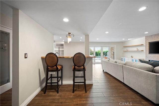 living room featuring dark hardwood / wood-style flooring