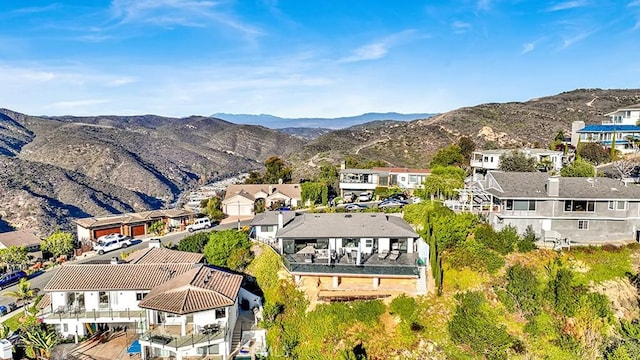 drone / aerial view featuring a mountain view