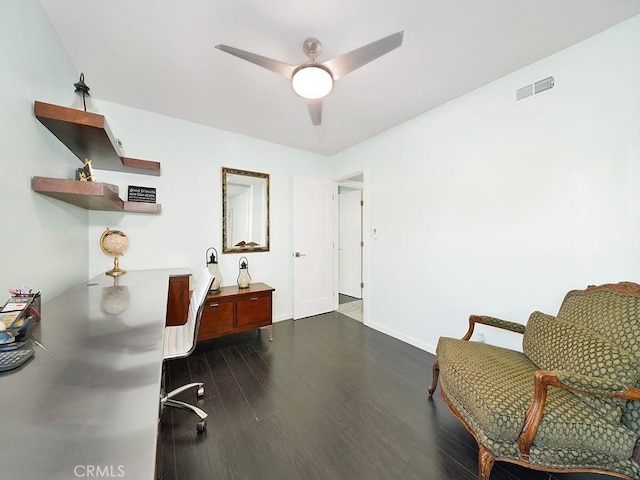 office space with ceiling fan and dark hardwood / wood-style floors