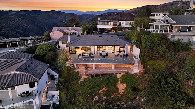 aerial view at dusk with a mountain view