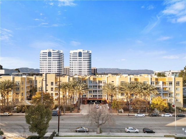 view of building exterior with a mountain view