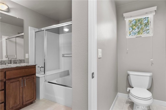 full bathroom featuring toilet, enclosed tub / shower combo, tile patterned flooring, and vanity