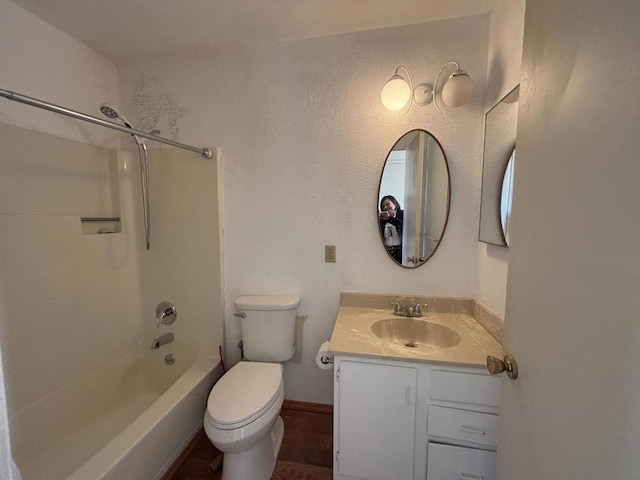 full bathroom with toilet, tub / shower combination, and vanity